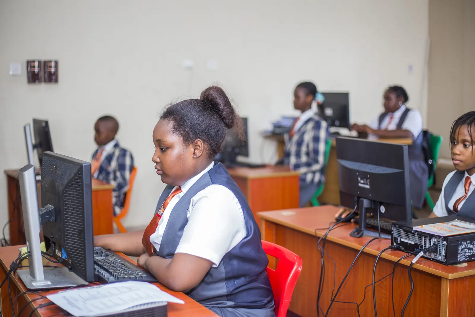 High School students working at computers in the ICT laboratory